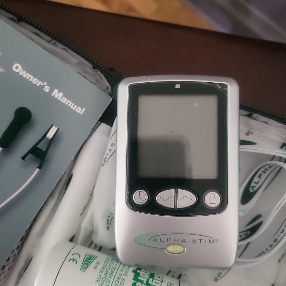 Alpha-Stim AID cranial electrotherapy stimulator